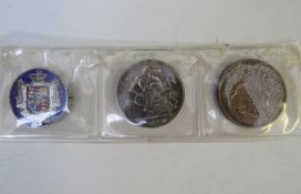 AN ENAMELLED HALF CROWN DATED 1836, together with a Victoria 1900 crown and a George VI 1937