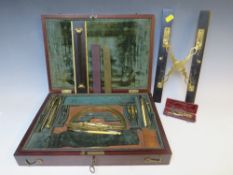 A GEORGIAN MAHOGANY CASE OF FINE MATHEMATICAL DRAWING INSTRUMENTS, to include brass gauges, German