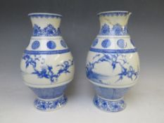 A PAIR OF CHINESE BLUE AND WHITE BALUSTER VASES WITH TEN CHARACTER MARKS, each vase decorated with