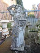 A LARGE STONE STATUE OF A LADY HOLDING A CASKET IN HER LEFT HAND, H 142 cm (Note - Heavy)