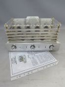 AN ICON AUDIO STEREO 50 VALVE AMPLIFIER, housed under thick plexiglass cover complete with