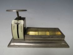 AN EARLY 20TH CENTURY PLATED COMBINATION STAMP BOX AND LETTER SCALE, scale H 8 cm, overall L 15 cm