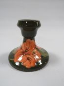 A MOORCROFT SQUAT CANDLESTICK