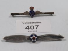 AN ANTIQUE SILVER AND ENAMEL PROPELLER BROOCH AND ANTIQUE SILVER ENAMEL RAF BROOCH
