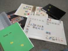 A COLLECTION OF STAMP ALBUMS TO INCLUDE GERMAN AND CANADIAN STAMPS