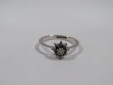 A HALLMARKED 9CT GOLD SAPPHIRE AND DIAMOND RING