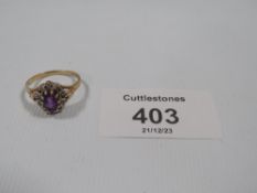 A HALLMARKED 9CT GOLD DRESS RING