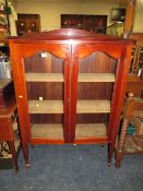 A 19TH CENTURY MAHOGANY GLAZED BOOKCASE