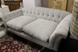A LARGE MODERN UPHOLSTERED SETTEE