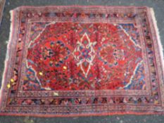 THREE 20TH CENTURY WOOLLEN RUGS