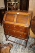 AN OAK BARLEY TWIST BUREAU