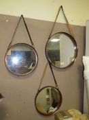 THREE MODERN CIRCULAR AND LEATHER MIRRORS