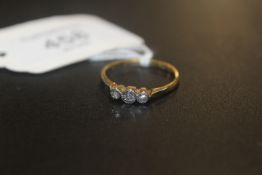 AN 18CT & PLAT THREE STONE DIAMOND RING SET WITH ILLUSION SET DIAMOND CHIP approx weight 2g SIZE 0