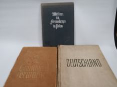 WWII THIRD REICH CIGARETTE CARD ALBUM TOGETHER WITH DEUTSCHLAND AND MIT DEM VII ARMEEKORPS IN