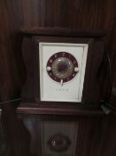 A VINTAGE EKCO RADIO ALARM CLOCK