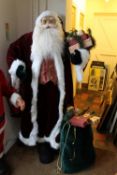 A 6FT MODERN SANTA CLAUSE WITH PRESENTS & SACK
