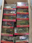 TWENTY FOUR MATCHBOX MODELS OF YESTERYEAR TRUCKS / BUSES IN RED BOXES