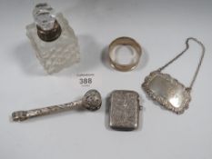 A SILVER WINE LABEL, SILVER TONGS, NAPKIN RING, VESTA CASE ETC
