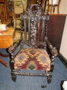 AN UNUSUAL ANTIQUE OAK CARVED THRONE ARMCHAIR