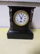 A SLATE MANTLE CLOCK