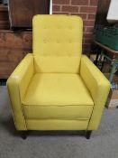 A MODERN YELLOW UPHOLSTERED 'GANTEX' ARMCHAIR