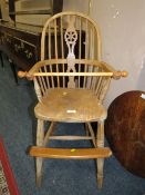 AN ANTIQUE CHILDS WINDSOR STYLE HIGH CHAIR