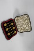 A SET OF SIX HALLMARKED SILVER GILT ANOINTING SPOONS IN FITTED CASE DATED 26 JUNE 1902