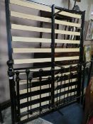 A MODERN BLACK METAL FRAMED DOUBLE BED FRAME W-139 CM