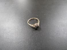 A HALLMARKED 18 CARAT GOLD SAPPHIRE AND DIAMOND CLUSTER RING APPROX 3g SIZE N