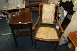 A SMALL EARLY 20TH CENTURY MAHOGANY DROPLEAF TABLE AND AN ARMCHAIR (2)