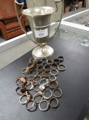 APPROX THIRTY THREE ASSORTED BASE METAL DRESS RINGS, TOGETHER WITH A BASE METAL TROPHY (34)