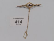 VICTORIAN 9CT GOLD BAR BROOCH SET WITH GARNET AND SEED PEARLS