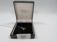 A 9CT GOLD DIAMOND AND AQUAMARINE NECKLACE