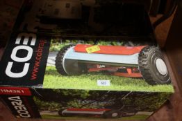 A BOXED COBRA PUSH MOWER