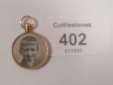 AN ANTIQUE HALLMARKED 9CT GOLD PICTURE LOCKET