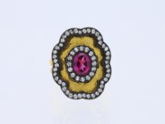 Ring mit Rhodolith und Diamanten in 999 Feingold