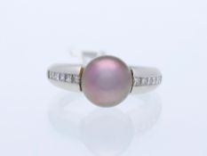 Ring mit Tahiti Zuchtperle und Diamanten in 950 Platin, signiert "BUNDA" 