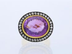 Ring mit Amethyst und Diamanten in 999 Feingold
