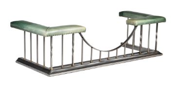 A BRUSHED STEEL AND GREEN LEATHER UPHOLSTERED CLUB FENDER