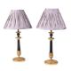 A PAIR OF BRONZE AND PARCEL GILT TABLE LAMPS - Image 1 of 2