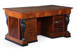 AN EMPIRE STYLE MAHOGANY AND EBONISED DESK