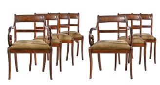 A SET OF SEVEN REGENCY MAHOGANY DINING CHAIRS