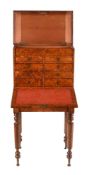 A VICTORIAN POLLARD OAK AND OAK TABLE TOP WRITING OR ARTISTS CABINET