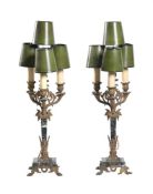 A PAIR OF FRENCH GILT METAL (PROBABLY SPELTER) MOUNTED FOUR LIGHT CANDELABRA