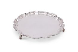 A SILVER SHAPED CIRCULAR SALVER