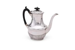 A VICTORIAN SILVER OVAL HALF LOBED COFFEE POT