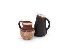A DOULTON LAMBETH SILVER-MOUNTED JUG MODELLED AS A LEATHER-JACK