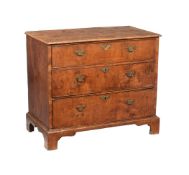 A WALNUT CHEST OF DRAWERS
