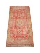 A CHINESE OR TIBETAN WOVEN CARPET