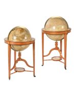 Y A VERY FINE PAIR OF REGENCY TWENTY-ONE INCH FLOOR-STANDING LIBRARY GLOBES